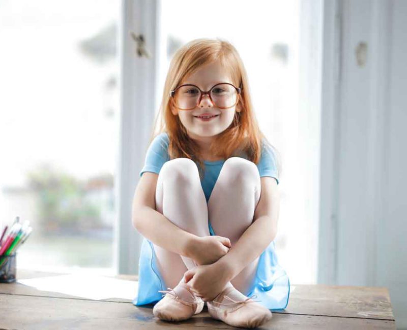 kid wearing glasses